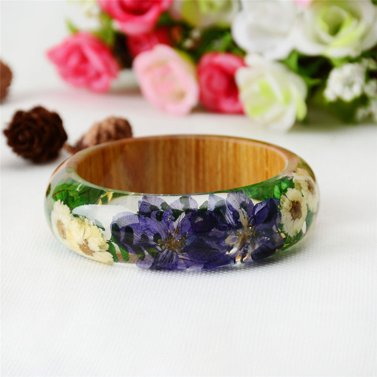 Blue Dried Flower and Resin Wood Bangle, bangle bracelet, botanical inspired, side view