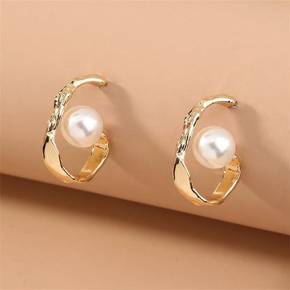 Pearl and 18K Gold-Plated Huggie Earrings, gold huggie earrings, botanical inspired, detail close-up