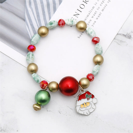 Red Enamel and Silver-Plated Santa Stretch Charm Bracelet, silver bracelet for women, botanical inspired, front view