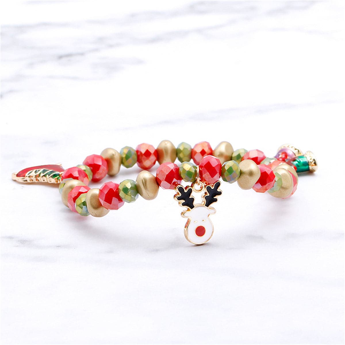 Red Acrylic and 18K Gold-Plated Reindeer Skates Charm Stretch Bracelet, gold bracelet for women, side view