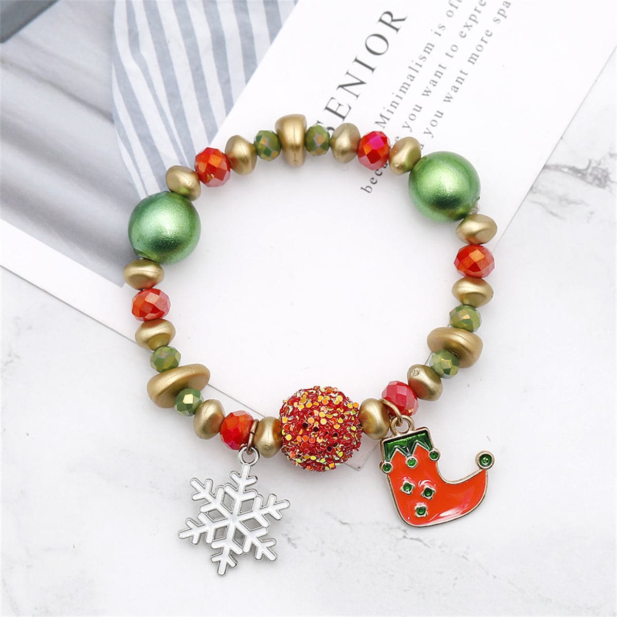 Red Enamel and Green Acrylic Snowflake Stocking Charm Stretch Bracelet, bracelet for women, everyday style, front view