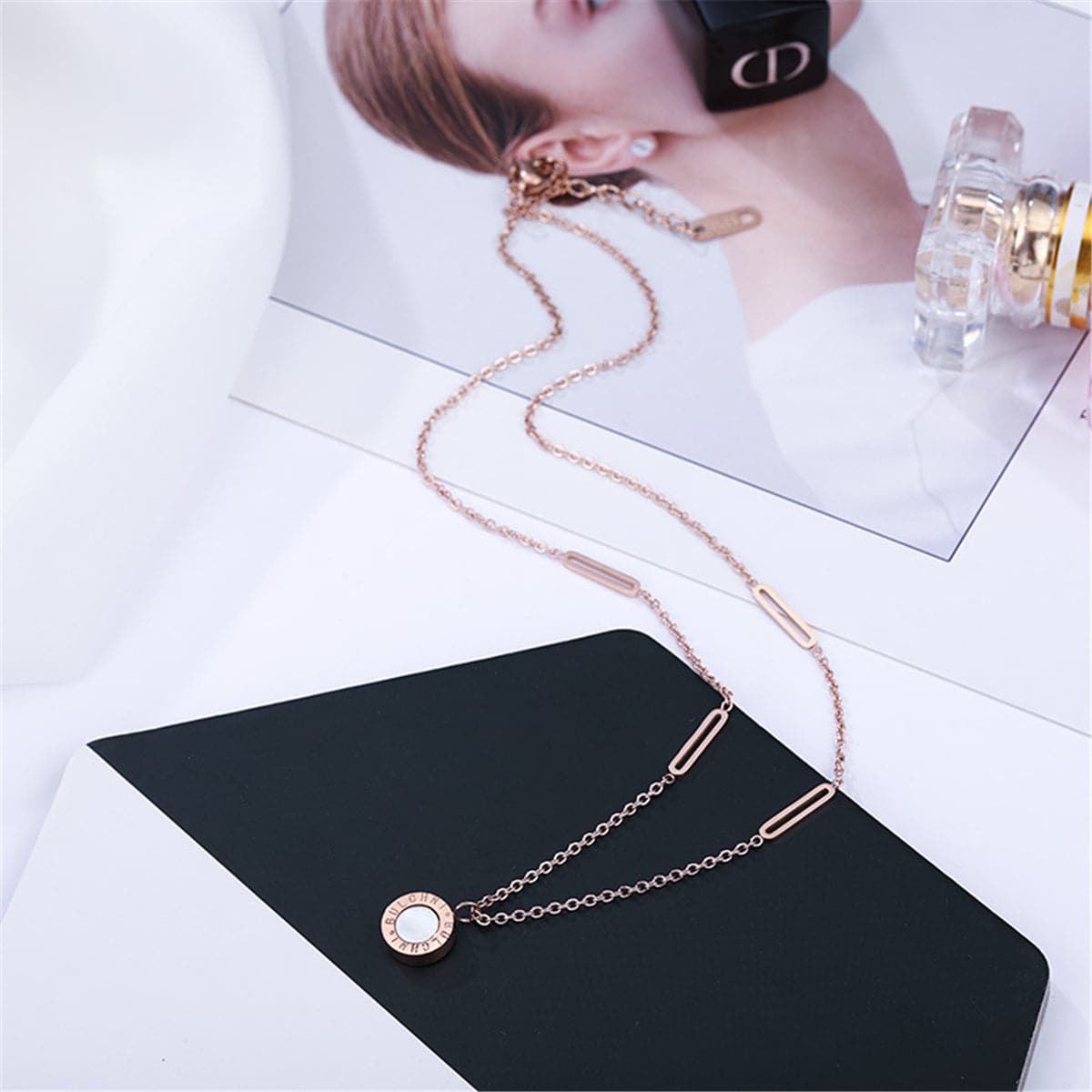 Black and 18K Rose Gold-Plated Roman Numeral Plate Pendant Necklace, rose gold pendant necklace for women, detail close-up