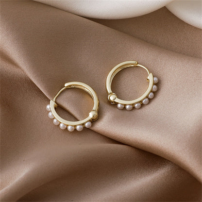 Pearl and 18K Gold-Plated Channel Huggie Earrings, gold huggie earrings, botanical inspired, side view
