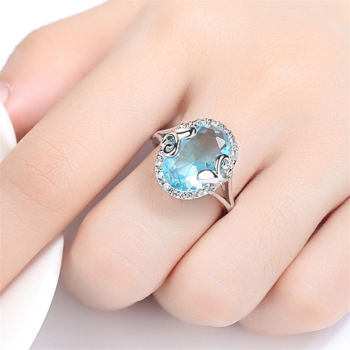 Blue Topaz and Cubic Zirconia Oval Halo Ring, statement rings for women, dainty minimalist design, front view