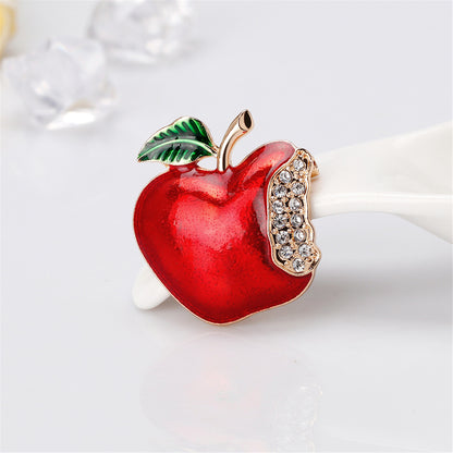 Cubic Zirconia and 18K Gold-Plated Bitten Apple Brooch, gold brooch pin, botanical inspired, front view