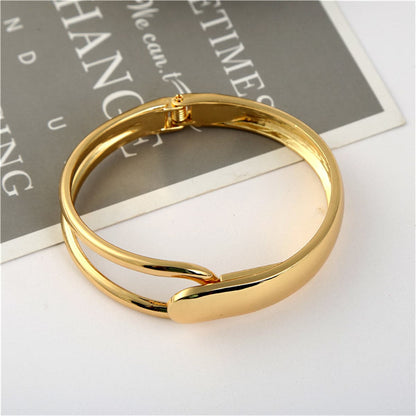 18K Gold-Plated Openwork Drop End Hinge Bangle, gold bangle bracelet, vintage-inspired design, detail close-up