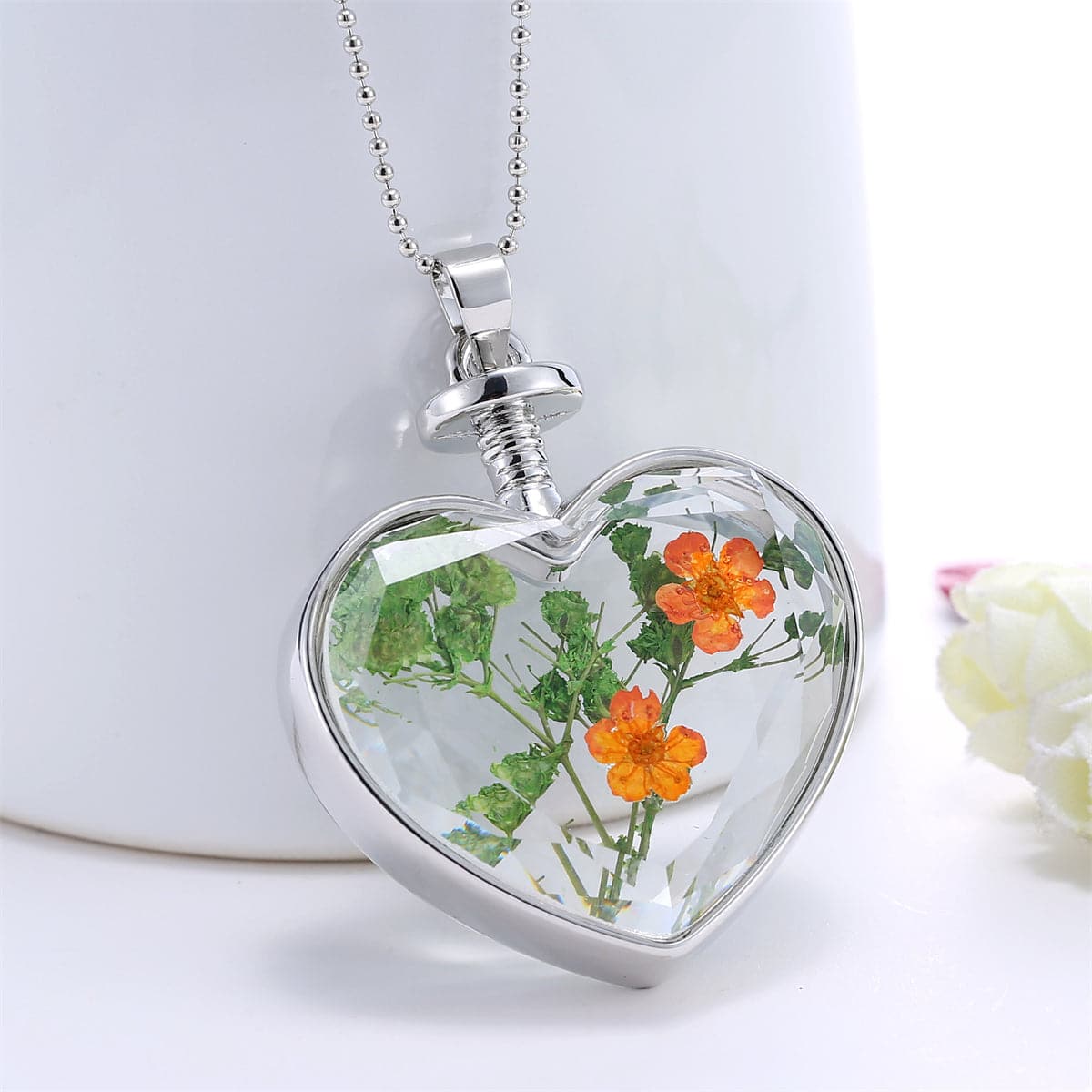 Pressed Peach Blossom and Silver-Plated Heart Pendant Necklace, silver pendant necklace for women, everyday style, side view