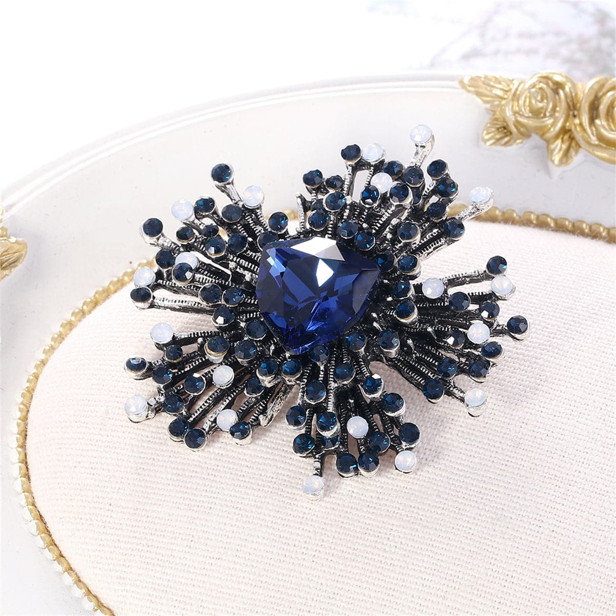 Blue Cubic Zirconia and Silver-Plated Flower Brooch, silver brooch pin, vintage-inspired design, side view