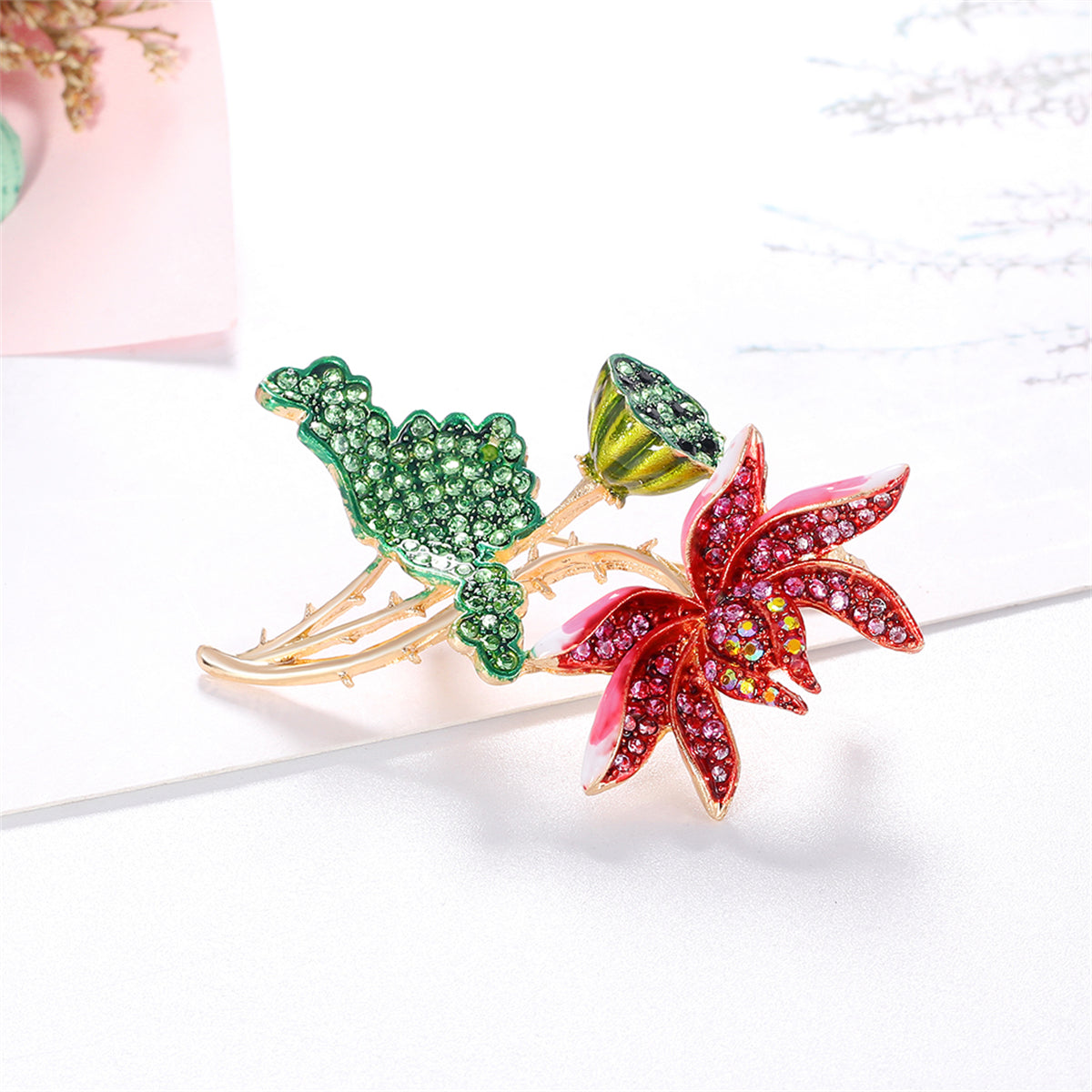 Green Enamel and Multicolor Cubic Zirconia 18K Gold-Plated Lotus Brooch, gold brooch pin, detail close-up