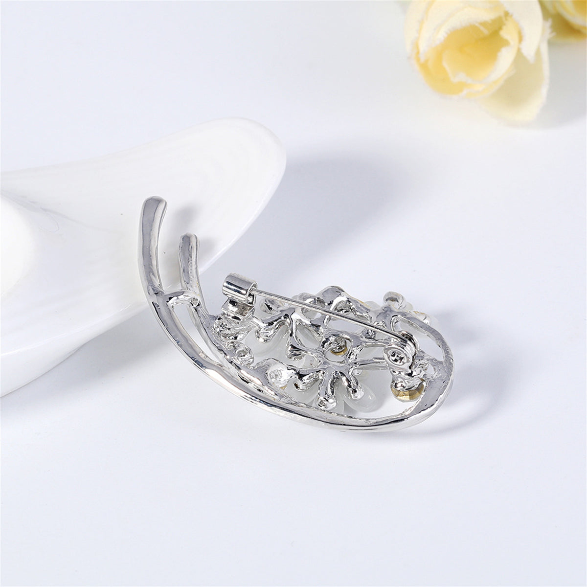 Clear Cubic Zirconia and Cats Eye Silver-Plated Botany Brooch, silver brooch pin, dainty minimalist design, side view