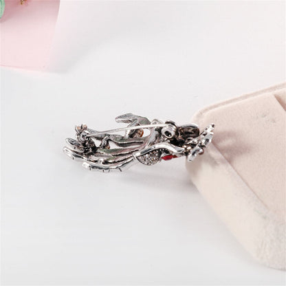 Cubic Zirconia and Silver-Plated Skeleton Hand Brooch, silver brooch pin, dainty minimalist design, detail close-up
