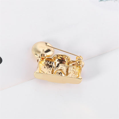 Cubic Zirconia and Gold-Plated Camera Brooch, gold brooch pin, dainty minimalist design, detail close-up