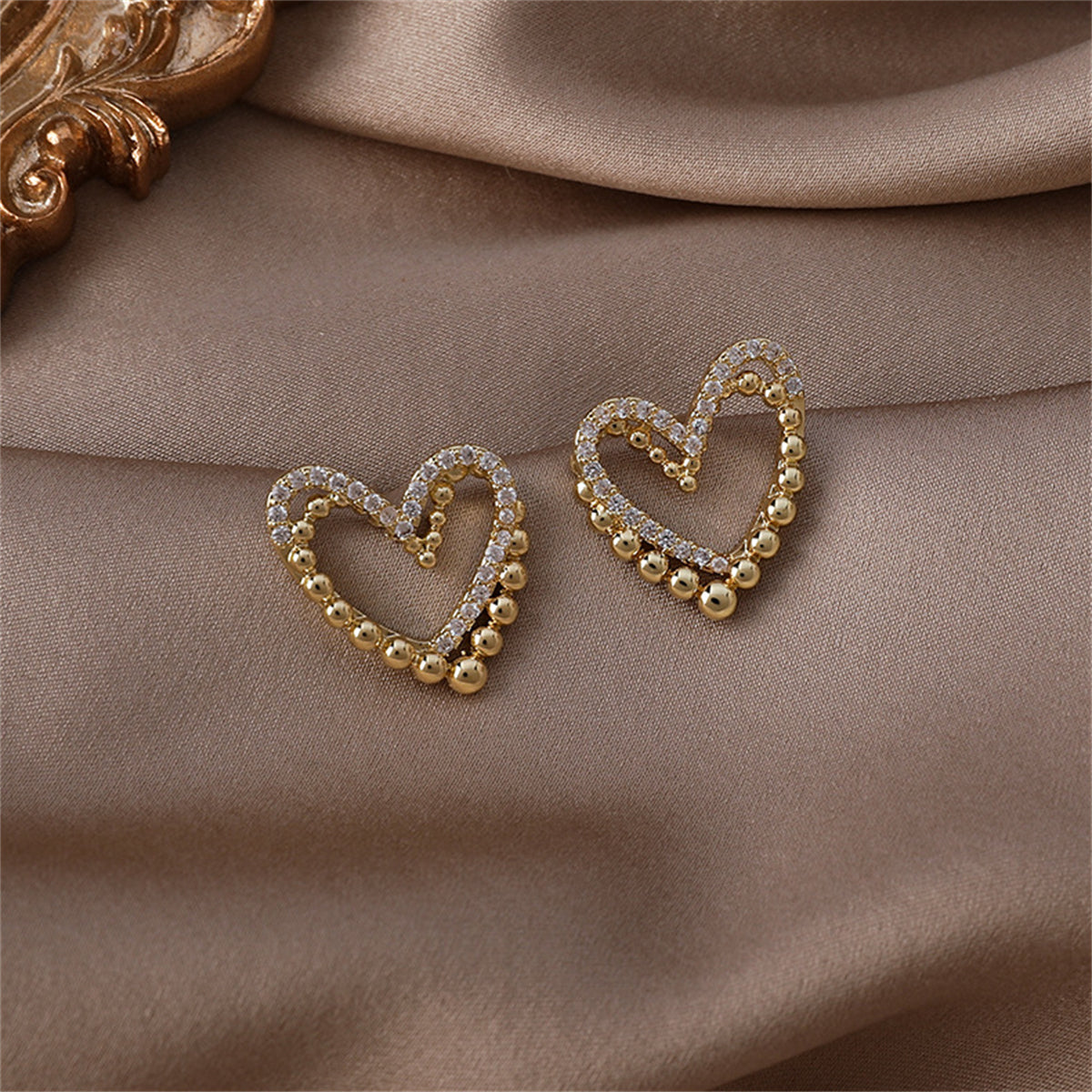 Cubic Zirconia and 18K Gold-Plated Interlocked Openwork Heart Stud Earrings, gold stud earrings for women, detail close-up