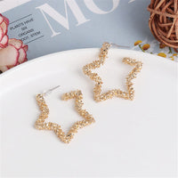 Goldtone Geometric Star Hoop Earrings