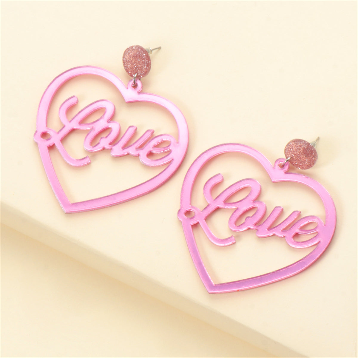 Pink and Silver-Plated Open Heart 'Love' Drop Earrings, silver drop earrings for women, vintage-inspired design, side view