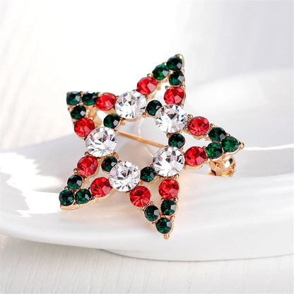 Cubic Zirconia and 18K Gold-Plated Hollow Star Brooch, gold brooch pin, botanical inspired, front view