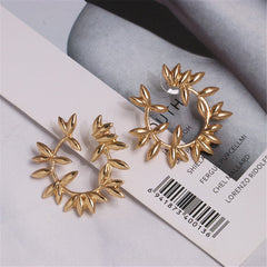Beautifully crafted 18K gold-plated earrings with a floral and leaf design, ideal for enhancing your style effortlessly.