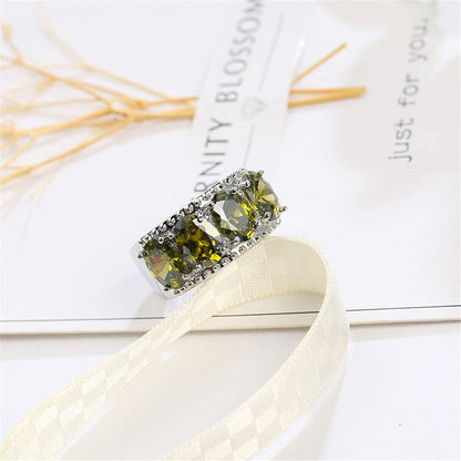 Olive Crystal and Silver-Plated Prong Ring, silver statement rings for women, botanical inspired, lifestyle look