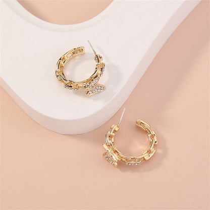 Cubic Zirconia and 18K Gold-Plated Chain Butterfly Huggie Earrings, gold huggie earrings, everyday style, detail close-up