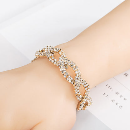Cubic Zirconia and 18K Gold-Plated Crossing Line Bracelet, gold bracelet for women, botanical inspired, detail close-up