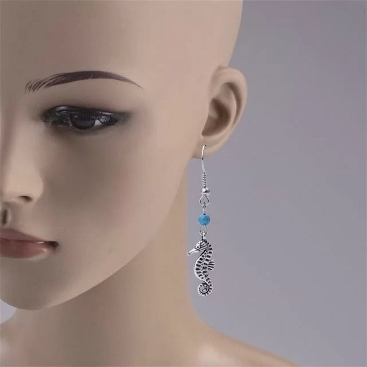 Turquoise and Silver-Plated Sea Horse Drop Earrings, silver drop earrings for women, vintage-inspired design, detail close-up