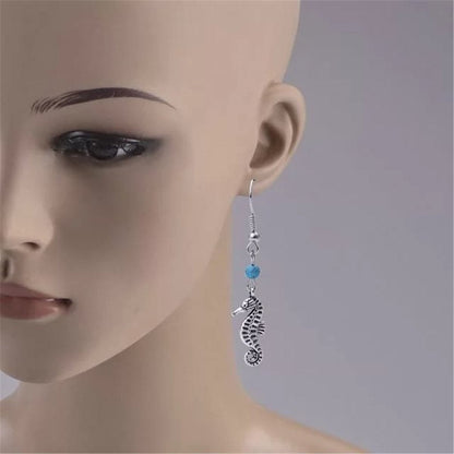 Turquoise and Silver-Plated Sea Horse Drop Earrings, silver drop earrings for women, vintage-inspired design, detail close-up