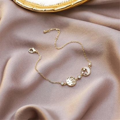 Cubic Zirconia and Shell 18K Gold Plated Round Moon Sun Charm Bracelet, gold bracelet for women, everyday style, side view