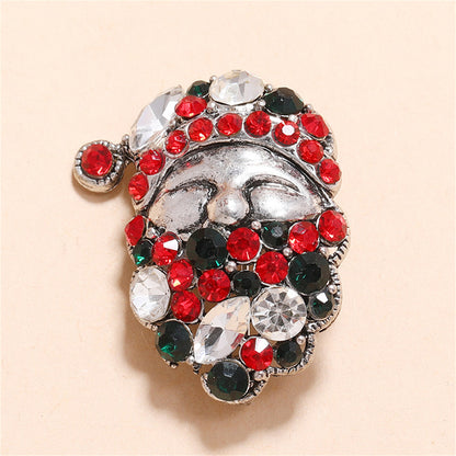 Green Cubic Zirconia and Silver-Plated Santa Brooch, silver brooch pin, botanical inspired, detail close-up