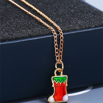Red Enamel and 18K Gold-Plated Stocking Pendant Necklace and Drop Earrings, gold drop earrings for women, detail close-up