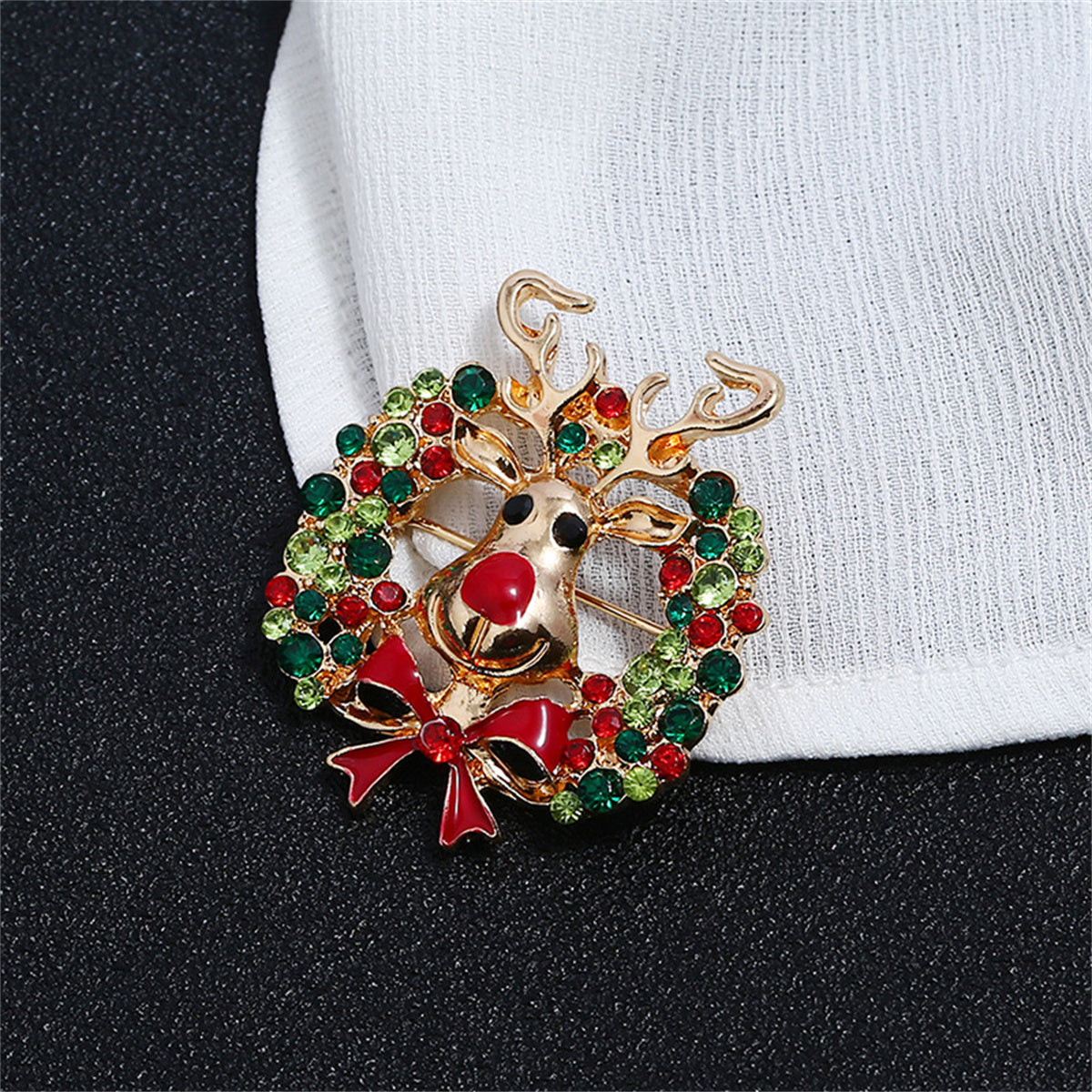 Cubic Zirconia and Enamel 18K Gold-Plated Reindeer Wreath Brooch, gold brooch pin, dainty minimalist design, detail close-up