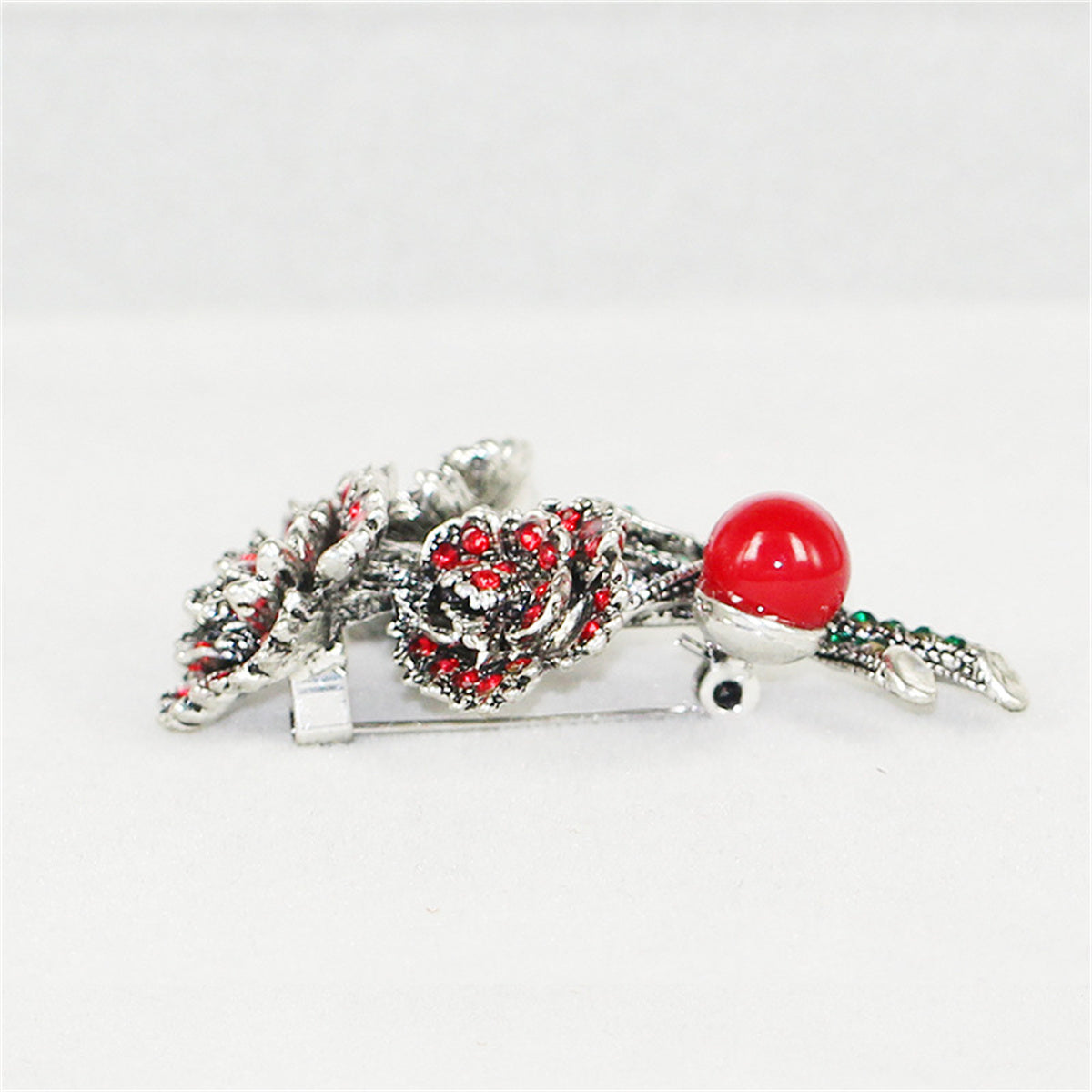 Cubic Zirconia and Red Resin Silver-Plated Flower Brooch, silver brooch pin, dainty minimalist design, detail close-up