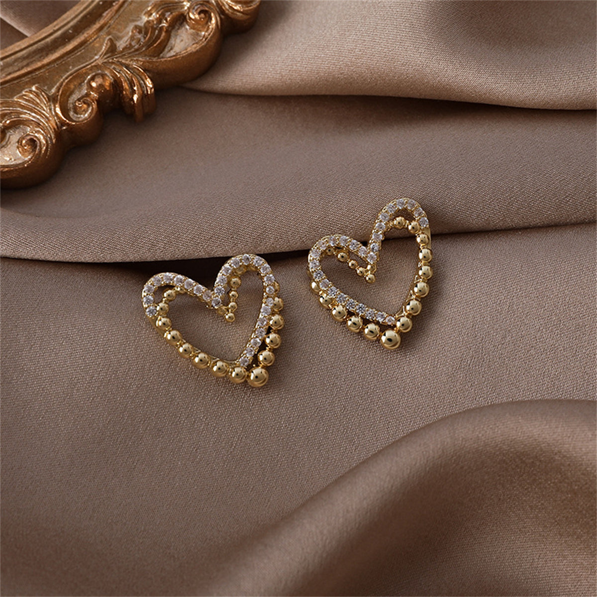 Cubic Zirconia and 18K Gold-Plated Interlocked Openwork Heart Stud Earrings, gold stud earrings for women, lifestyle look
