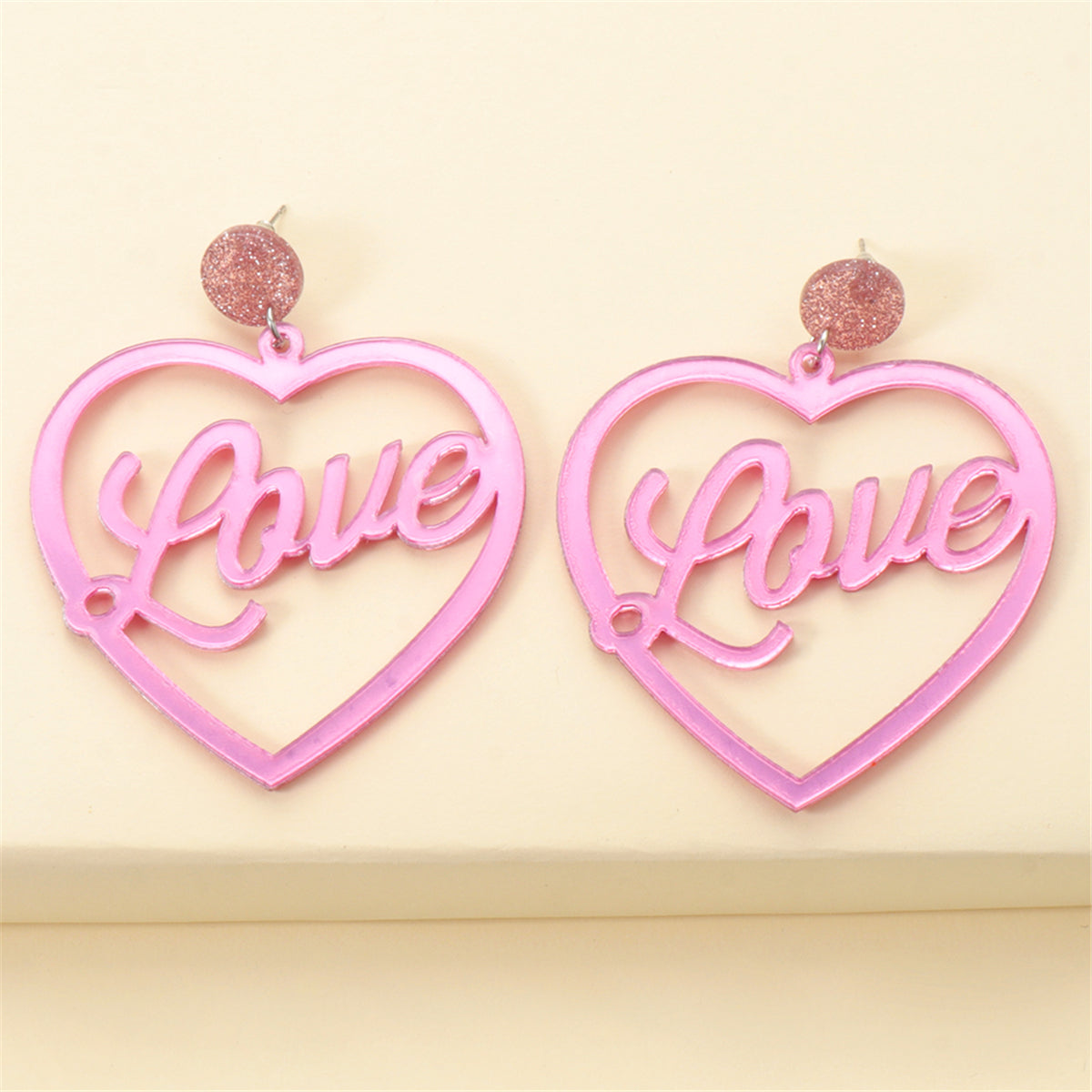 Pink and Silver-Plated Open Heart 'Love' Drop Earrings, silver drop earrings for women, vintage-inspired design, styled look