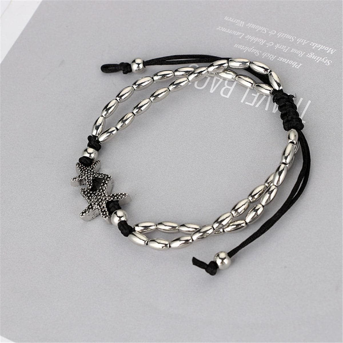 Black and Silver-Plated Starfish Charm Adjustable Anklet, silver anklet bracelet, botanical inspired, side view