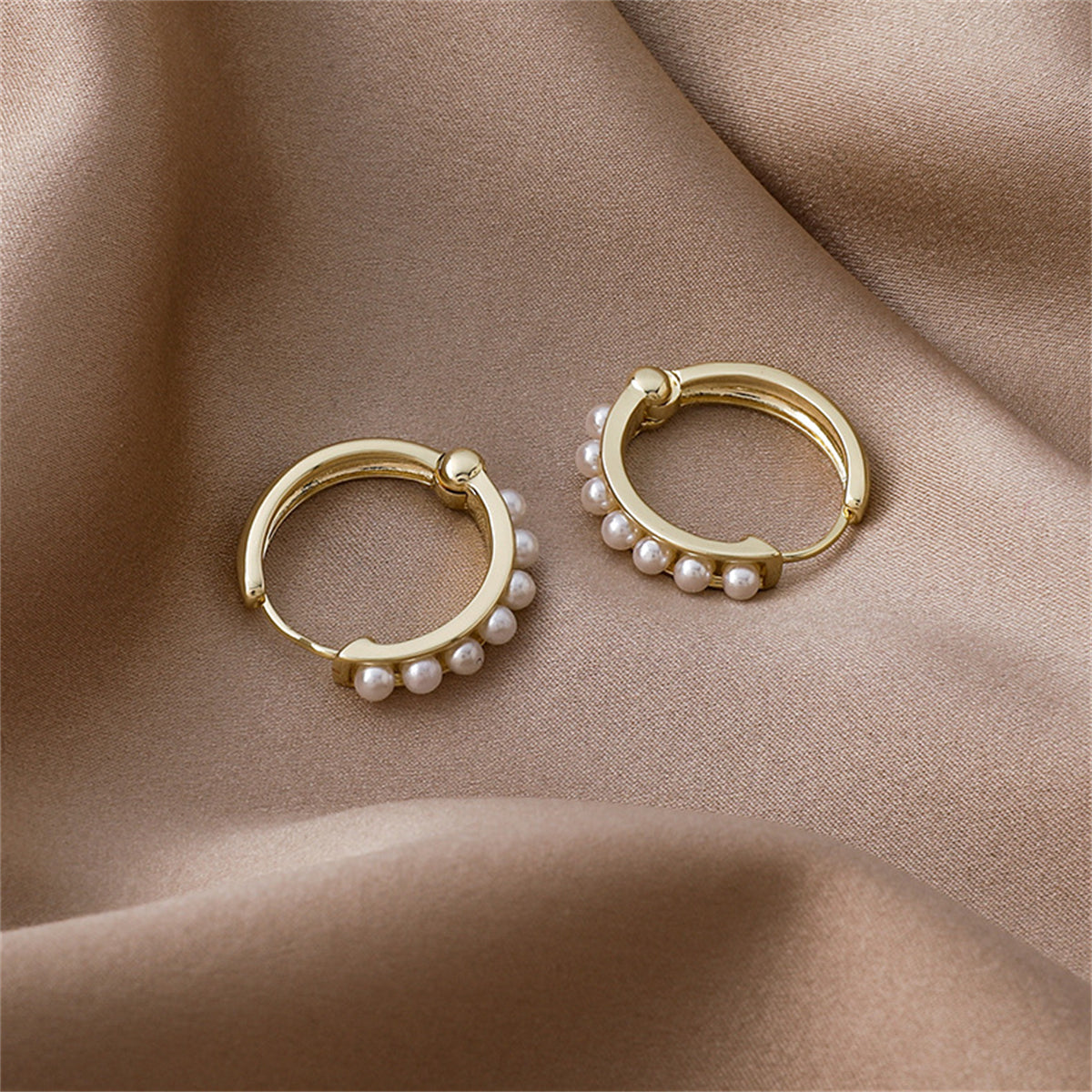 Pearl and 18K Gold-Plated Channel Huggie Earrings, gold huggie earrings, botanical inspired, detail close-up