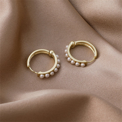 Pearl and 18K Gold-Plated Channel Huggie Earrings, gold huggie earrings, botanical inspired, detail close-up