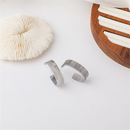 Marble Acrylic and Silver-Plated Huggie Earrings, silver huggie earrings, botanical inspired, side view