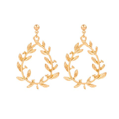 Stunning 18K gold-plated drop earrings adorned with a botanical wreath and intricate leaf details, ideal for nature lovers.