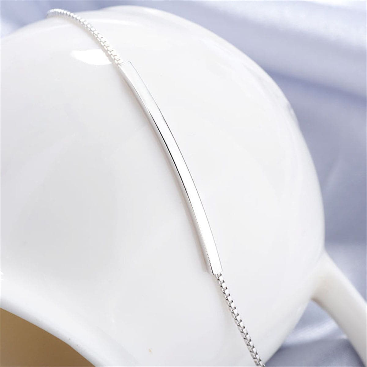 Silver-Plated Curved Bar Bracelet