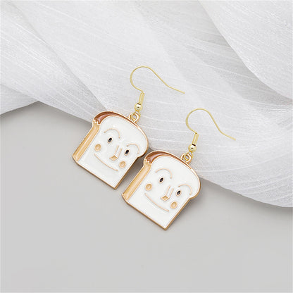 White Enamel and 18K Gold-Plated Toast Drop Earrings, gold drop earrings for women, vintage-inspired design, detail close-up