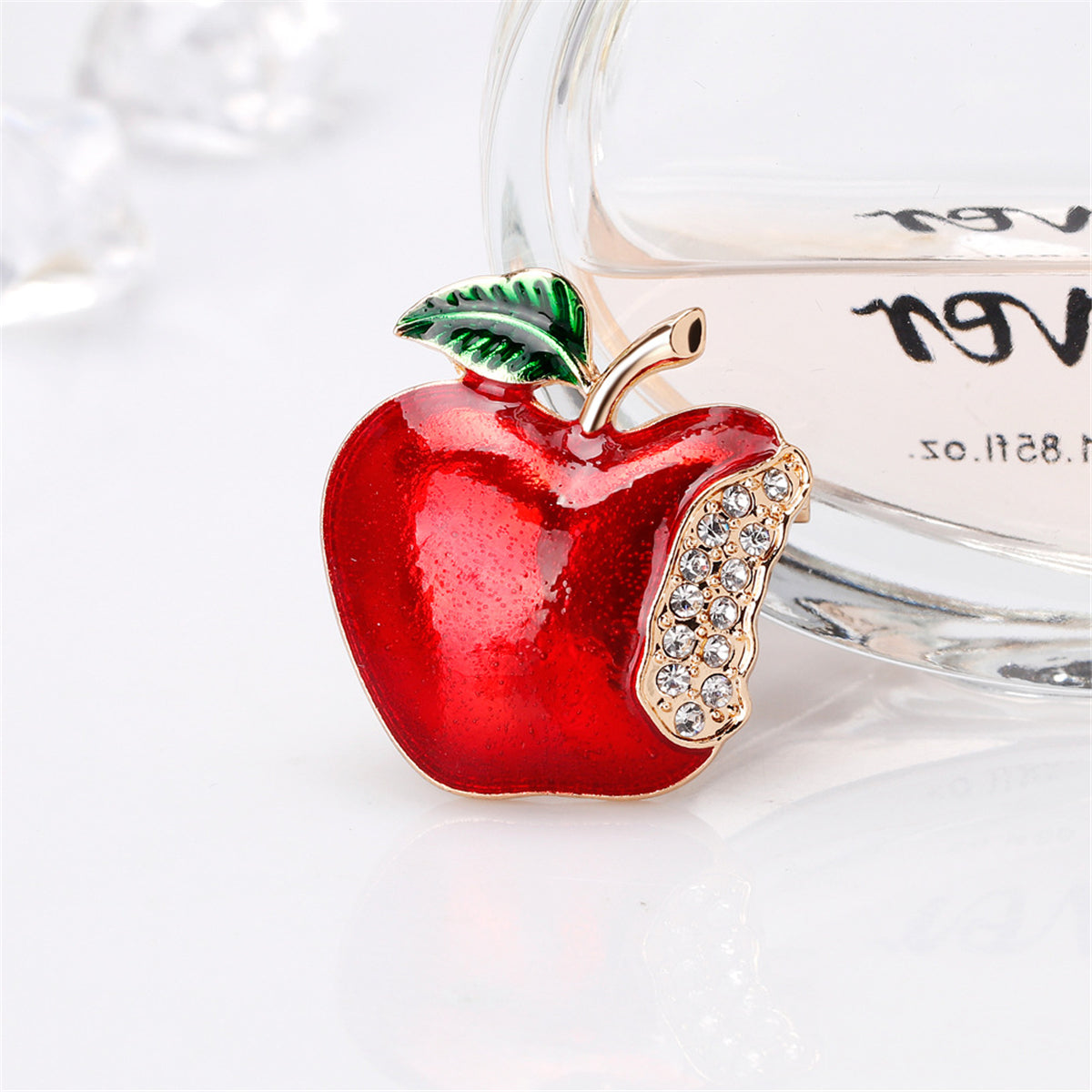 Cubic Zirconia and 18K Gold-Plated Bitten Apple Brooch, gold brooch pin, botanical inspired, detail close-up