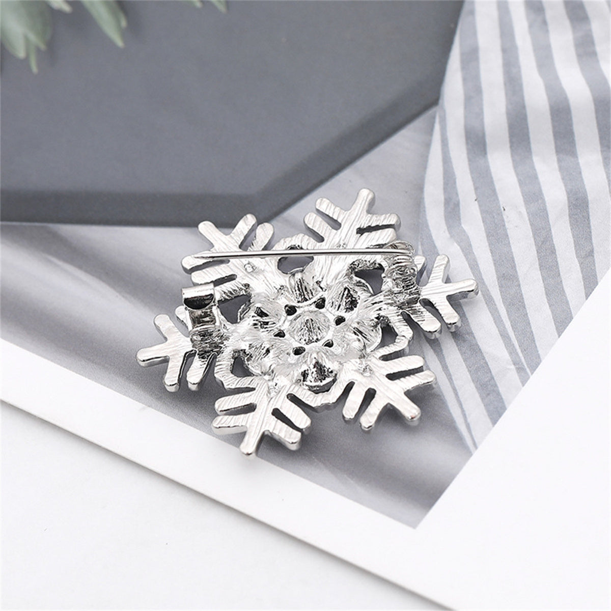 Cubic Zirconia and Silver-Plated Openwork Snowflake Brooch, silver brooch pin, botanical inspired, detail close-up