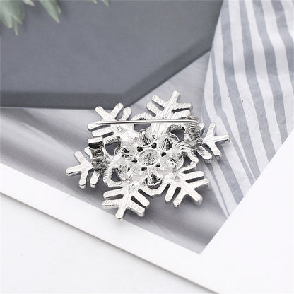 Cubic Zirconia and Silver-Plated Openwork Snowflake Brooch, silver brooch pin, botanical inspired, detail close-up