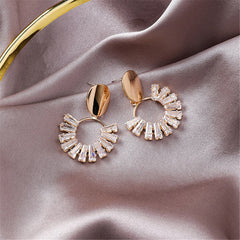 Beautiful 18K gold-plated circle drop earrings embellished with sparkling crystals, showcasing a chic gold and white color scheme.