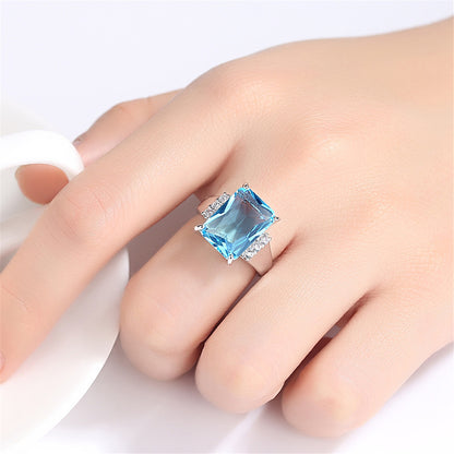 Blue Crystal and Cubic Zirconia Princess-Cut Ring, statement rings for women, botanical inspired, front view