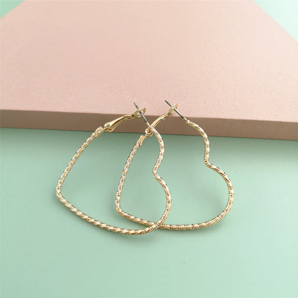 Goldtone Twisted Open Heart Hoop Earrings