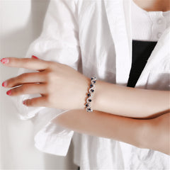 Cubic Zirconia & Blue Crystal Prong Crossing Line Tennis Bracelet