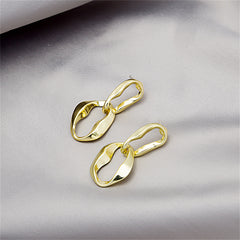Eye-catching 18K gold-plated earrings with a sophisticated twisted design, perfect for elevating your accessory game.