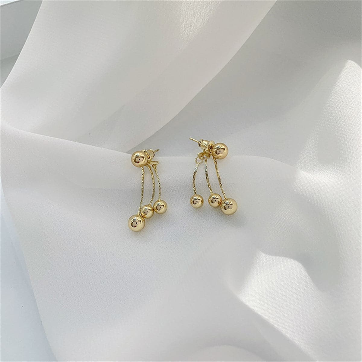18K Gold-Plated Waterfall Ball Tassel Ear Jackets, gold drop earrings for women, botanical inspired, lifestyle look