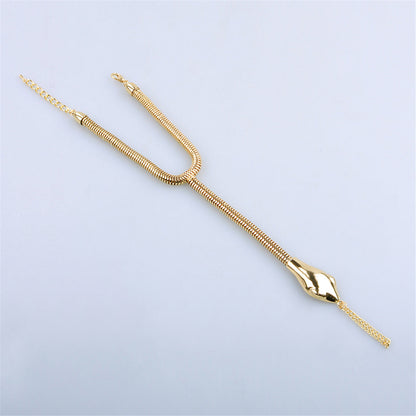 18K Gold-Plated Snake Chain Ankle-To-Ring Anklet, gold statement rings for women, dainty minimalist design, detail close-up